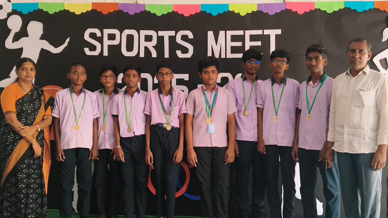 Students with medals at sports meet